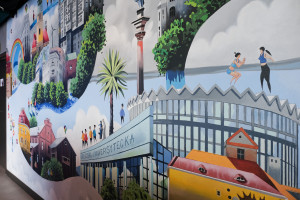 Tytus Brzozowski stworzył mural dla Google. To spacer po najważniejszych miejscach w Warszawie
