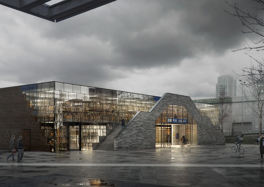 Cyrkularny parking dla rowerów w Eindhoven, z oknami z wagonów kolejowych na elewacji. fot. de Architekten Cie / AbsentMatter